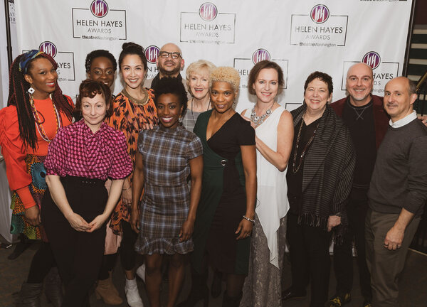 group of people in front of step and repeat reading helen hayes awards
