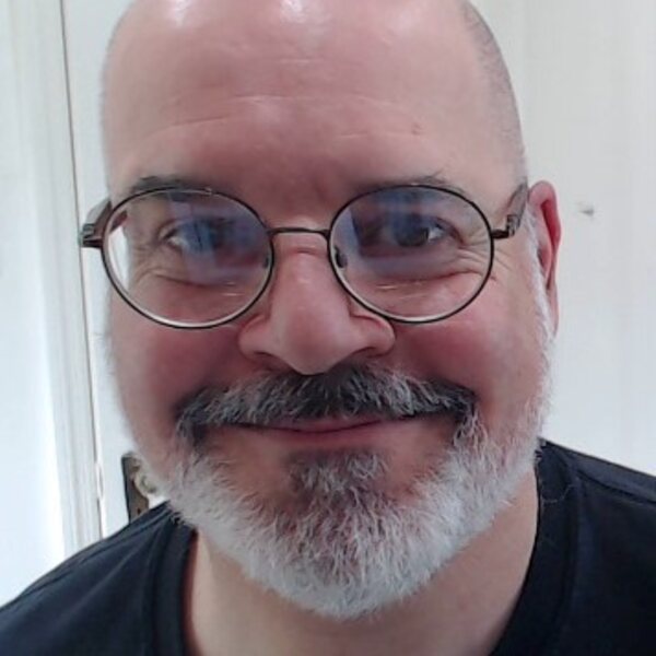 Bruce falk casual head shot (bald, bearded, glasses-wearing middle-aged white guy)